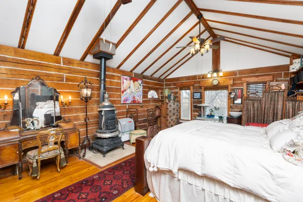 a street sign on a wall next to a building