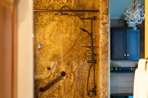 a front view of house with a garden