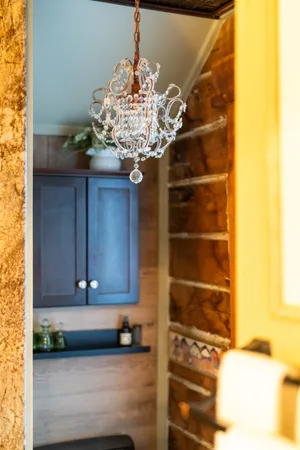 a view of a house with a yard balcony and sitting area