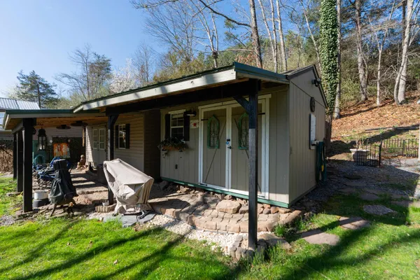 a backyard of a house with lots of green space