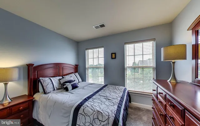 a bedroom with a bed and with tv