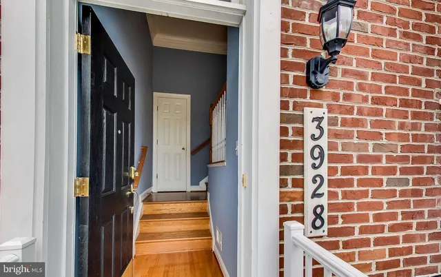 a kitchen with stainless steel appliances granite countertop a refrigerator stove and sink