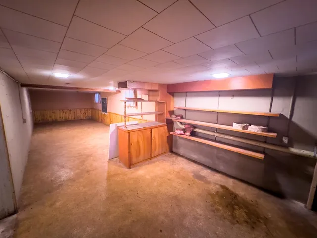 a view of kitchen with furniture and a kitchen