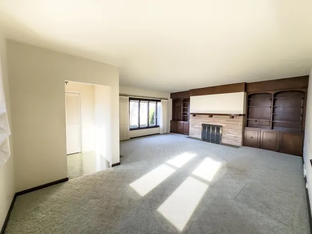 a view of a livingroom with a fireplace