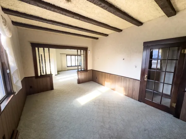 a view of livingroom with furniture and window