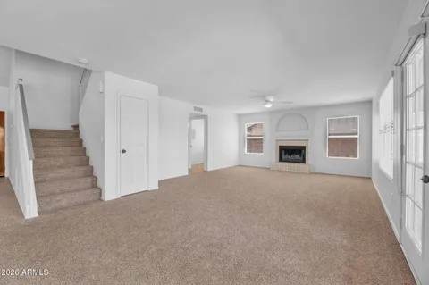 a aerial view of a house with table and chairs