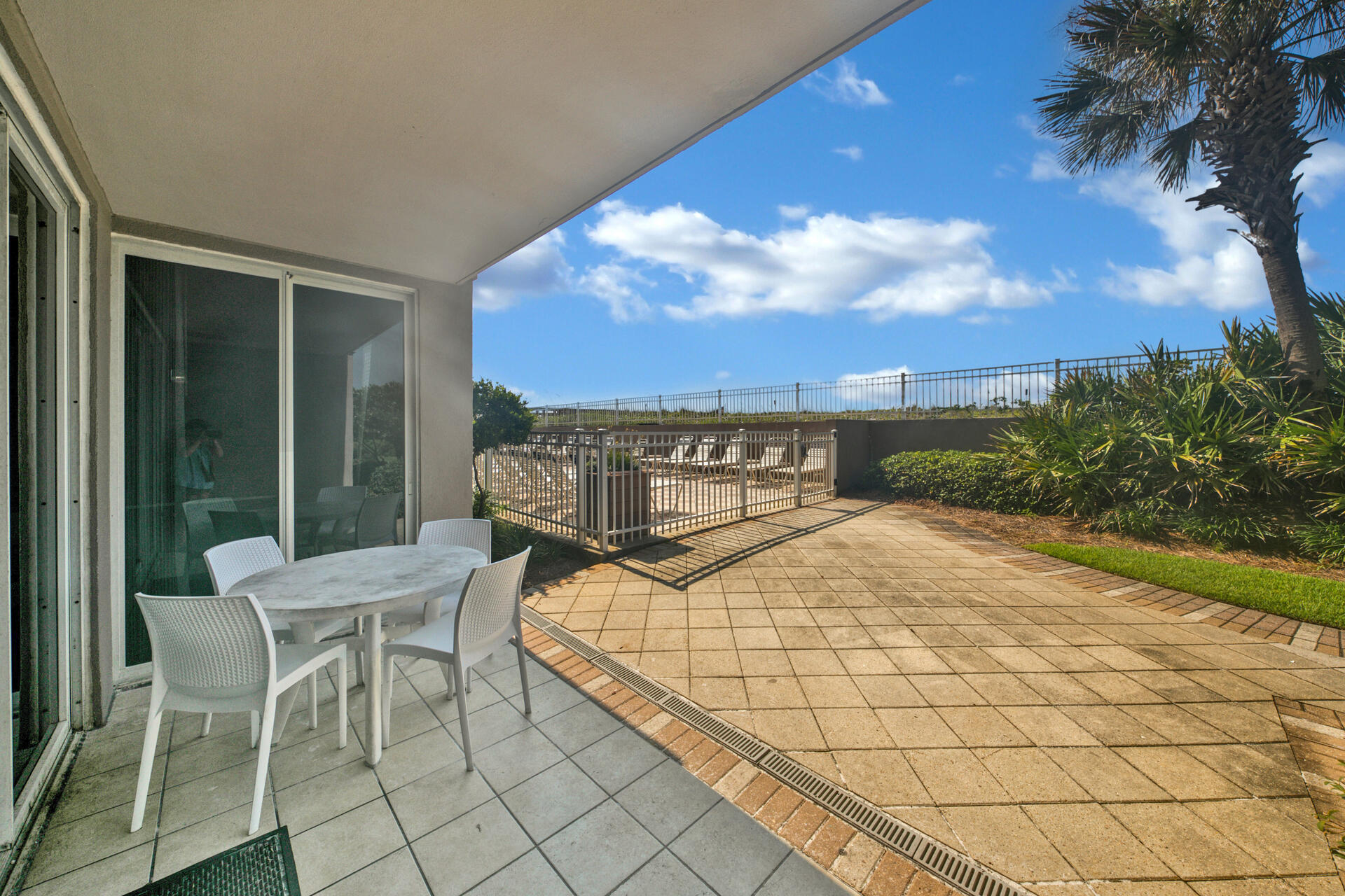 520 Santa Rosa Boulevard, Unit 111 Fort Walton Beach, FL 32548 - Photo 20 of 38 a view of a terrace with furniture and a table