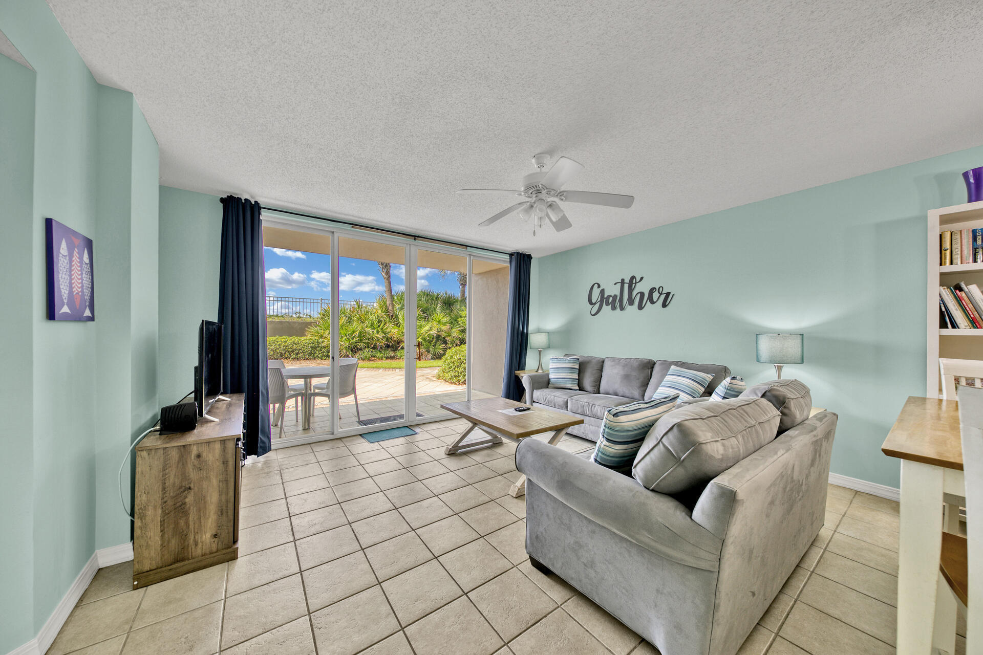 520 Santa Rosa Boulevard, Unit 111 Fort Walton Beach, FL 32548 - Photo 29 of 38 a living room with furniture and a large window