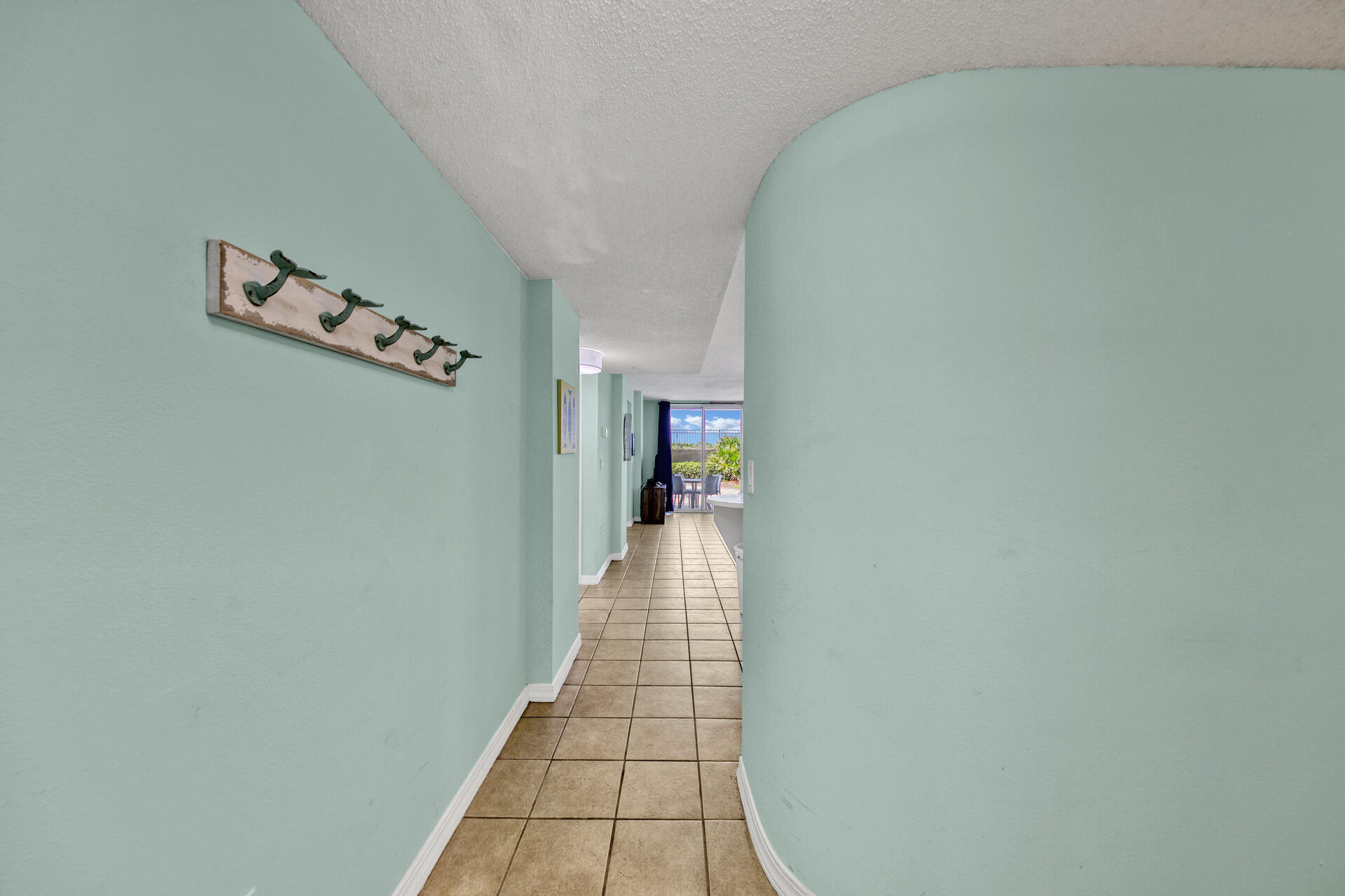 520 Santa Rosa Boulevard, Unit 111 Fort Walton Beach, FL 32548 - Photo 37 of 38 a view of a hallway with a white walls