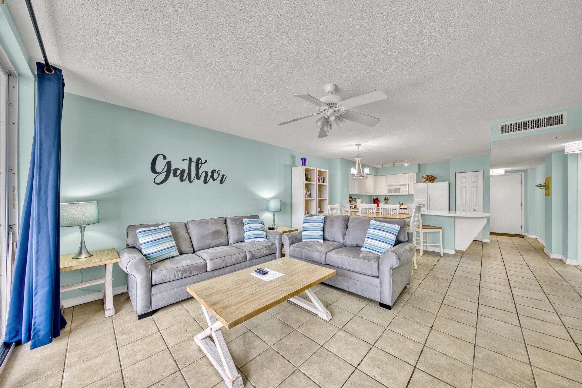 520 Santa Rosa Boulevard, Unit 111 Fort Walton Beach, FL 32548 - Photo 4 of 38 a living room with furniture and a chandelier