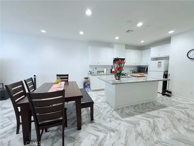 a workspace with furniture and window