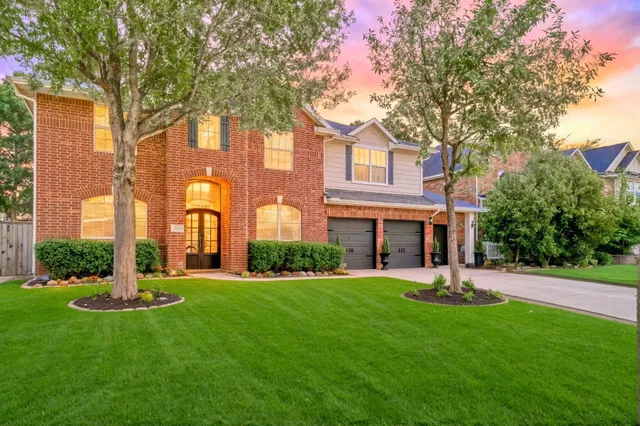 a view of a building with a yard