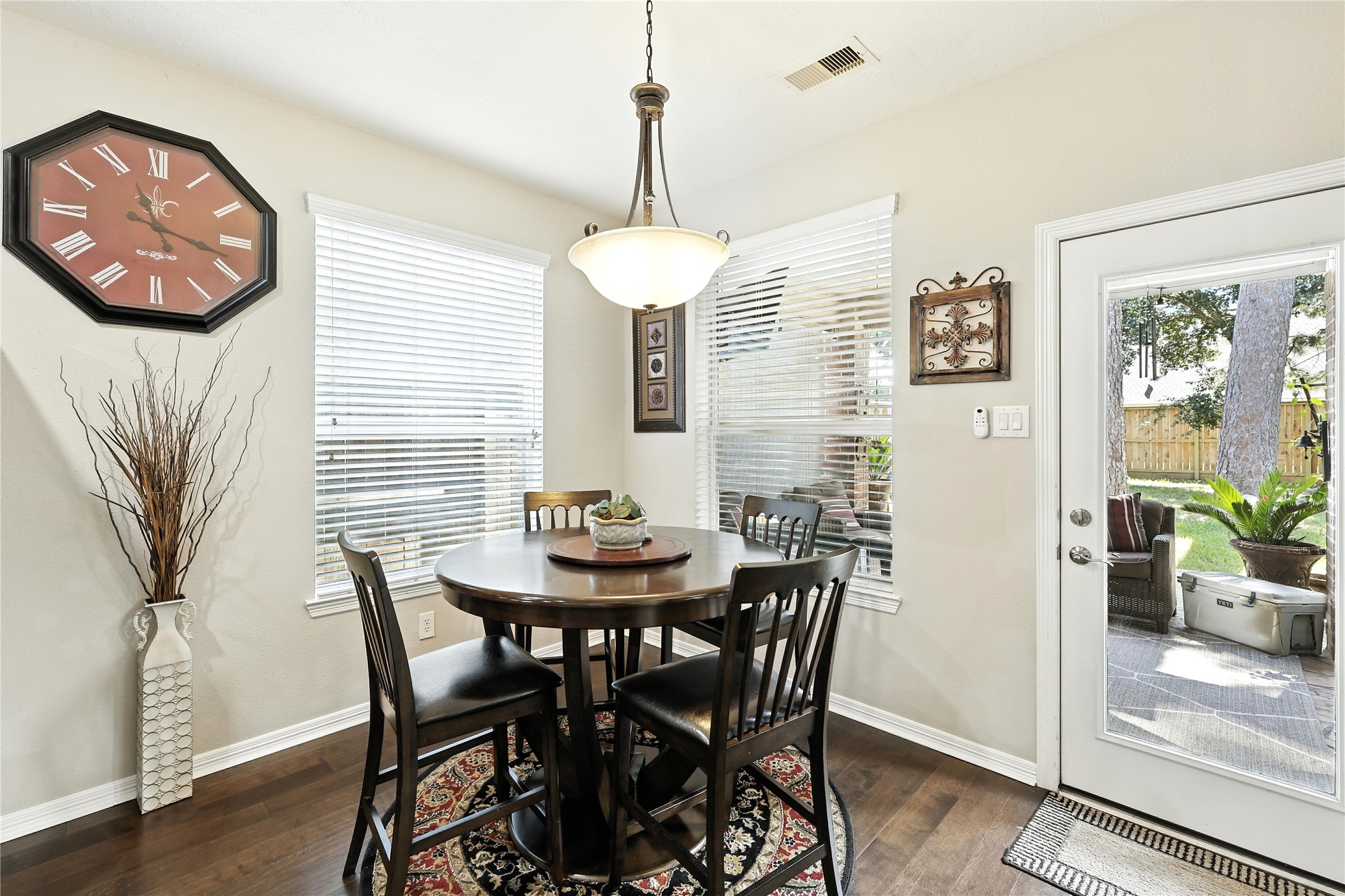25218 Piney Heights Lane Spring, TX 77389 - Photo 14 of 40 a view of a dining room with furniture window and wooden floor