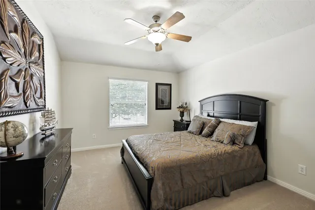 a bedroom with a bed and a closet