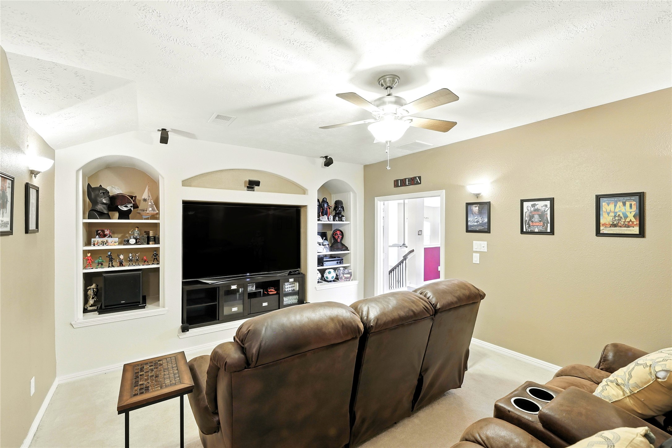 25218 Piney Heights Lane Spring, TX 77389 - Photo 33 of 40 a living room with furniture and a flat screen tv