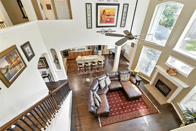 a kitchen with stainless steel appliances granite countertop a stove a refrigerator and a microwave