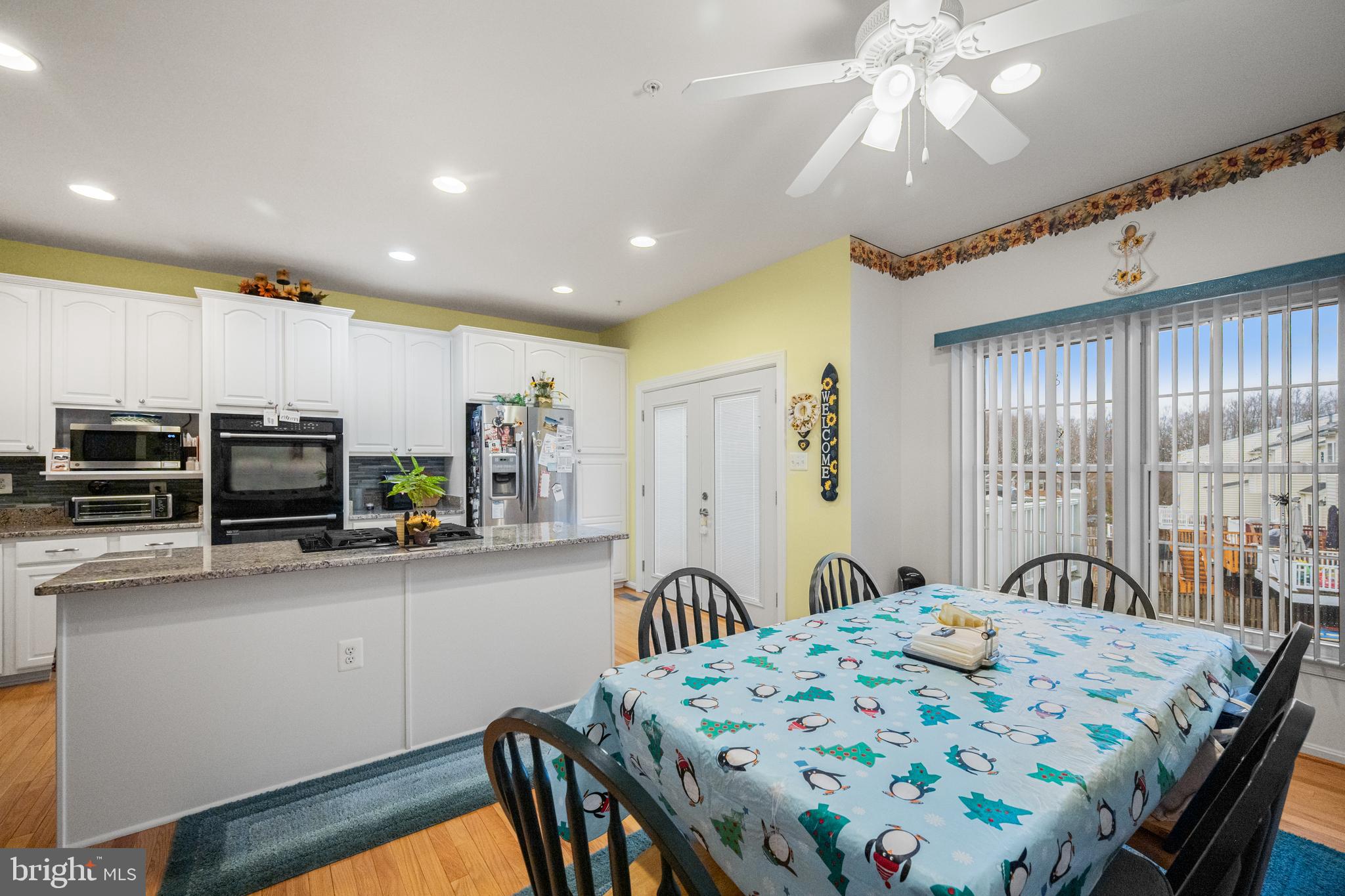 804 Mericrest Way Odenton, MD 21113 - Photo 9 of 34 Open kitchen and dining area.