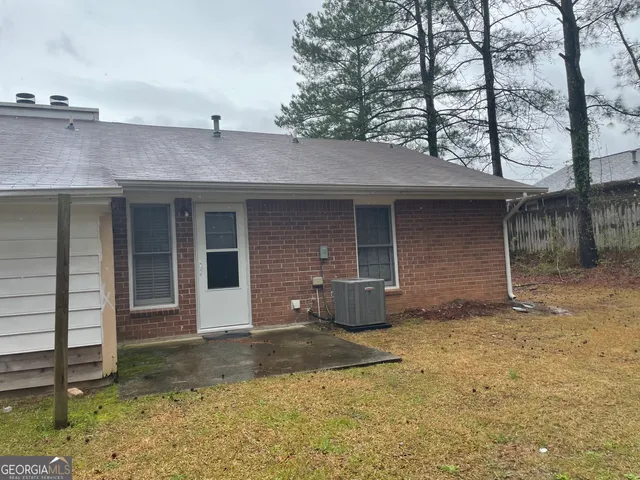 a front view of a house with a garage