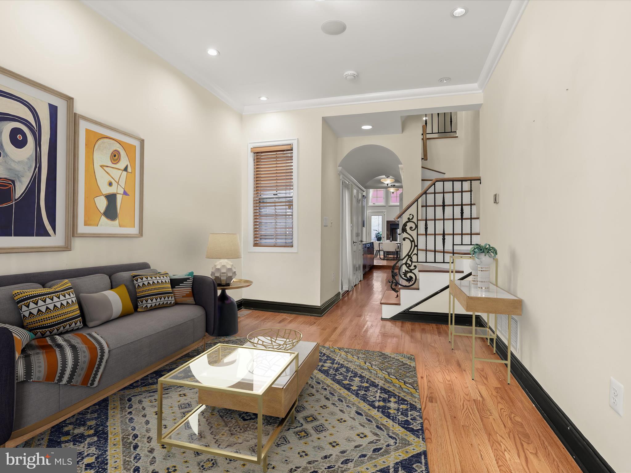 427 South Eden Street Baltimore, MD 21231 - Photo 2 of 66 Living Room Staged Using Virtual Tools