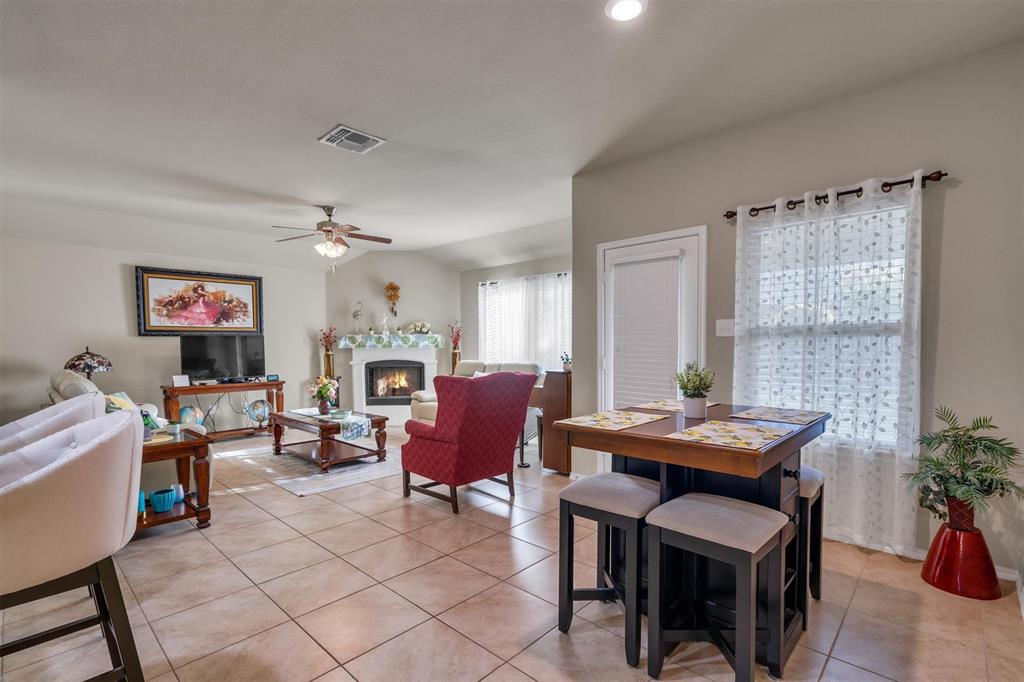 520 Rustic Oak Lane McKinney, TX 75072 - Photo 14 of 37 a view of a livingroom with furniture and a window