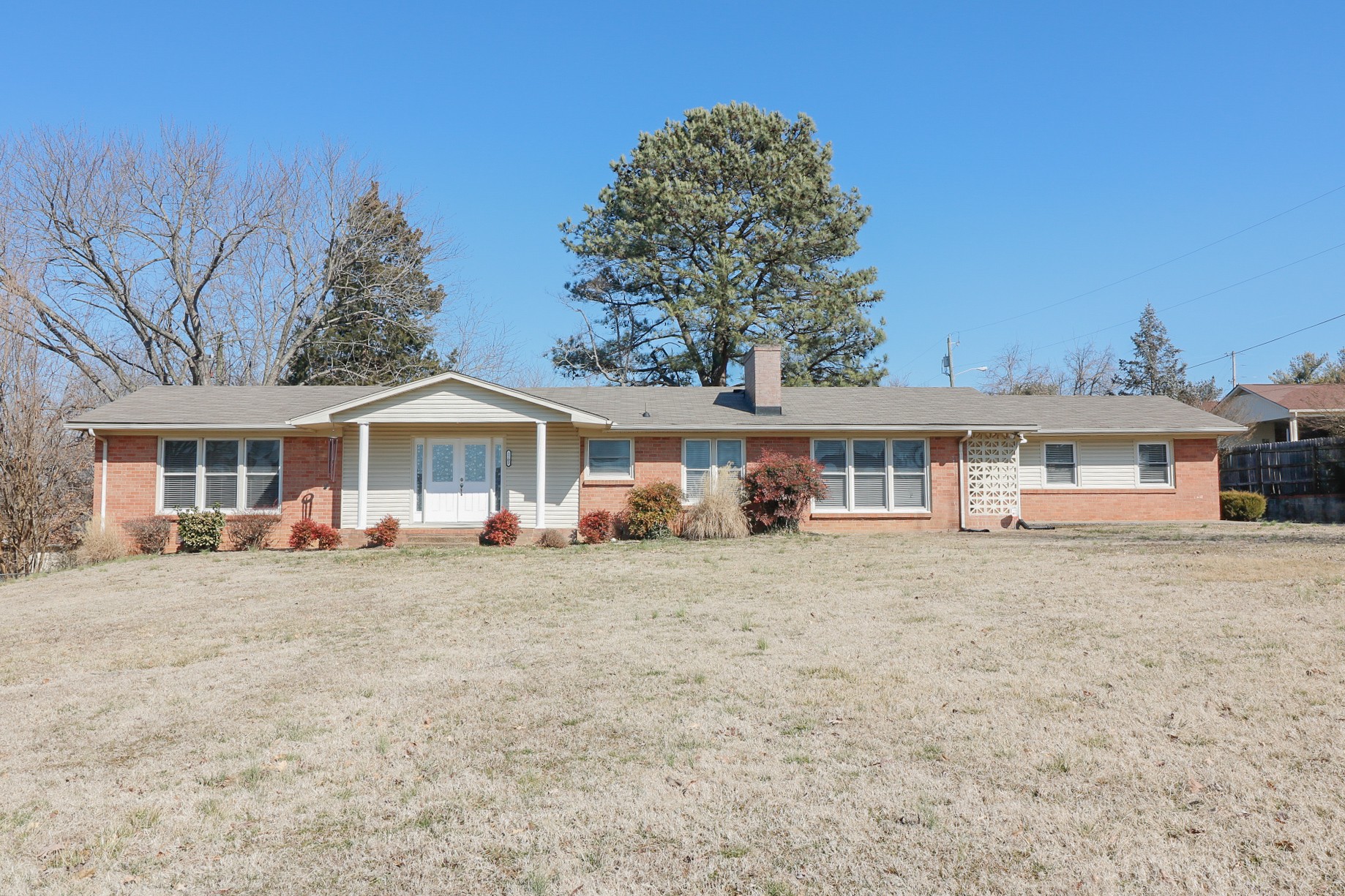 front view of a house with a patio