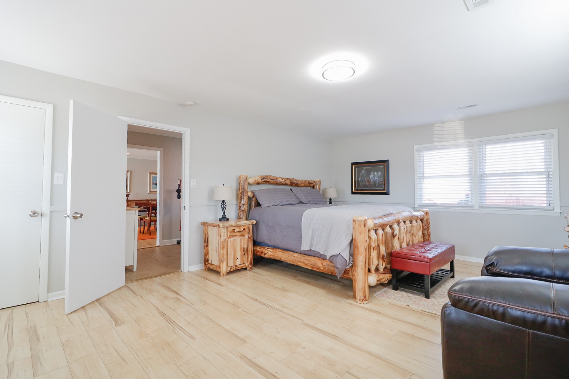 2202 Ruth Street Springfield, TN 37172 - Photo 19 of 51 a spacious bedroom with a bed and a couch