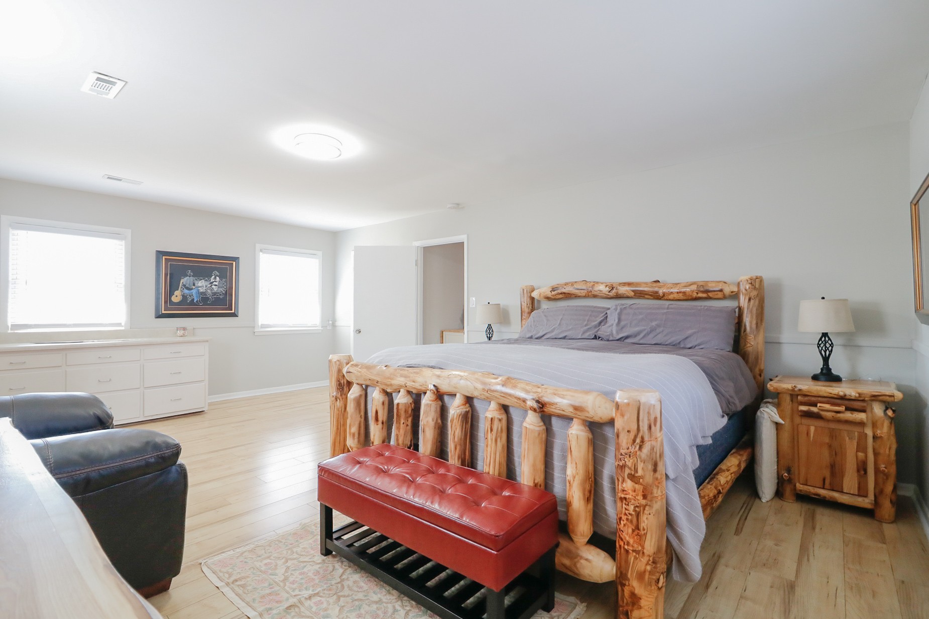 2202 Ruth Street Springfield, TN 37172 - Photo 20 of 51 a bedroom with a bed and wooden floor