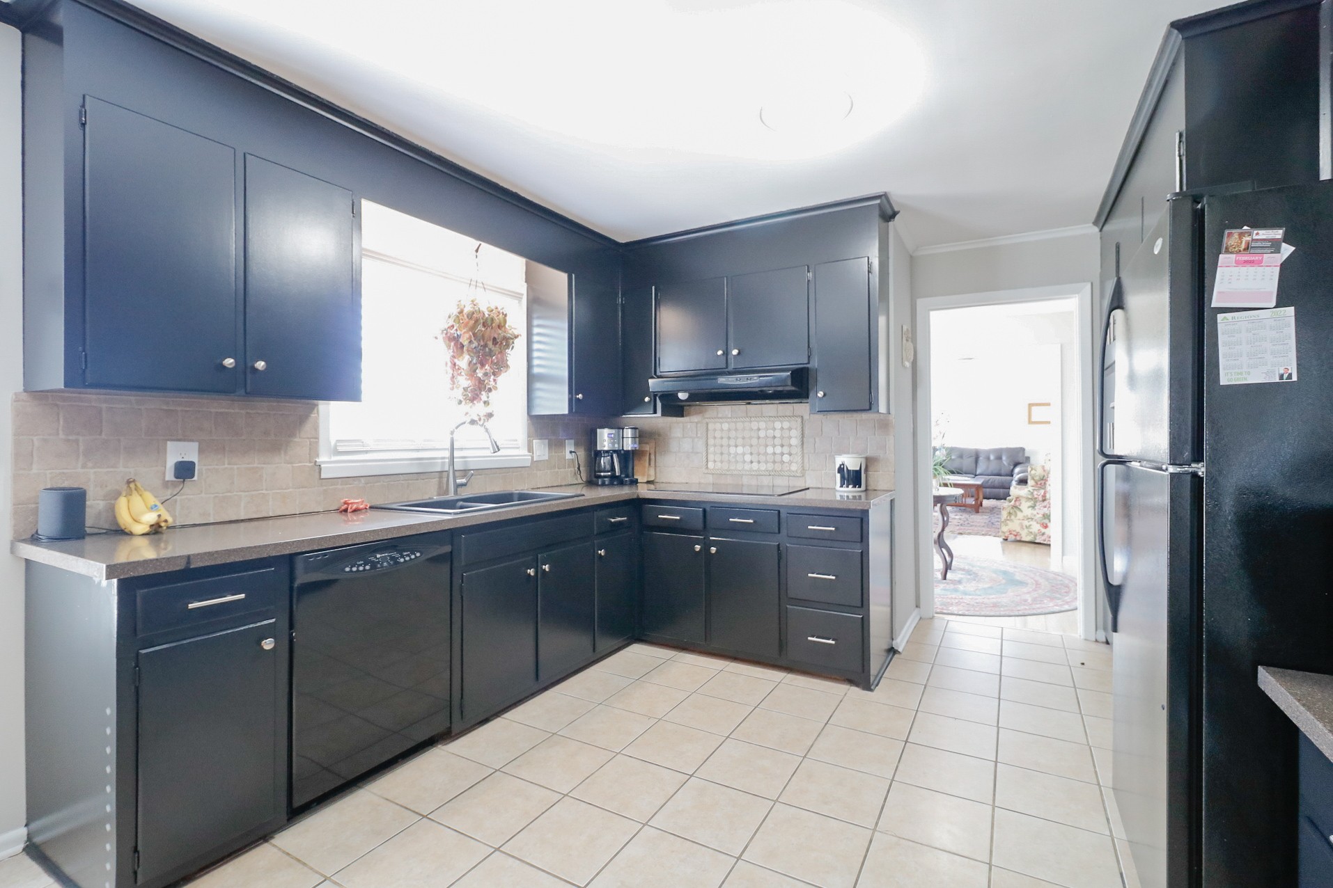 2202 Ruth Street Springfield, TN 37172 - Photo 23 of 51 a kitchen with a sink window and refrigerator