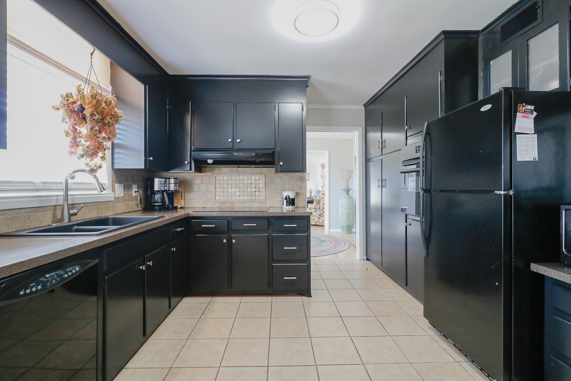 2202 Ruth Street Springfield, TN 37172 - Photo 24 of 51 a kitchen with stainless steel appliances granite countertop a refrigerator and a sink