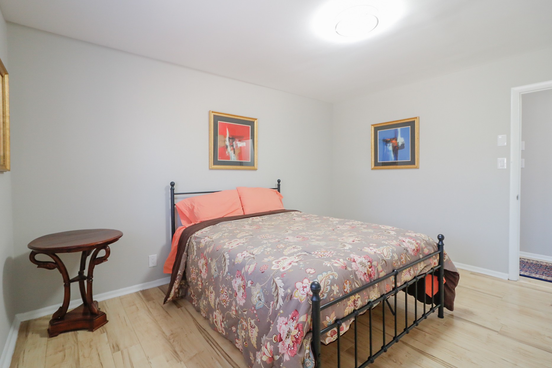 2202 Ruth Street Springfield, TN 37172 - Photo 42 of 51 a bedroom with a bed and a chandelier