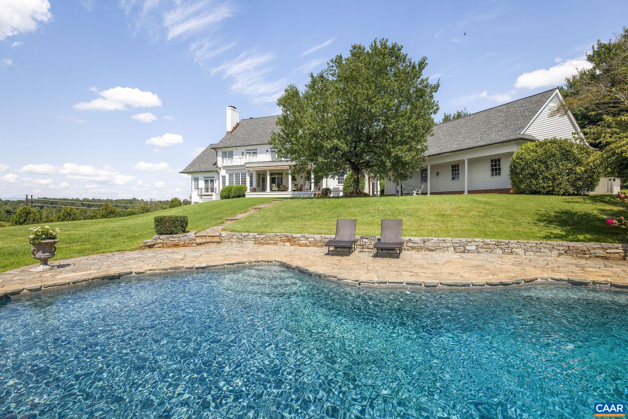 3365 Stony Point Road Charlottesville, VA 22911 - Photo 15 of 75 a view of a house with a big yard and palm trees