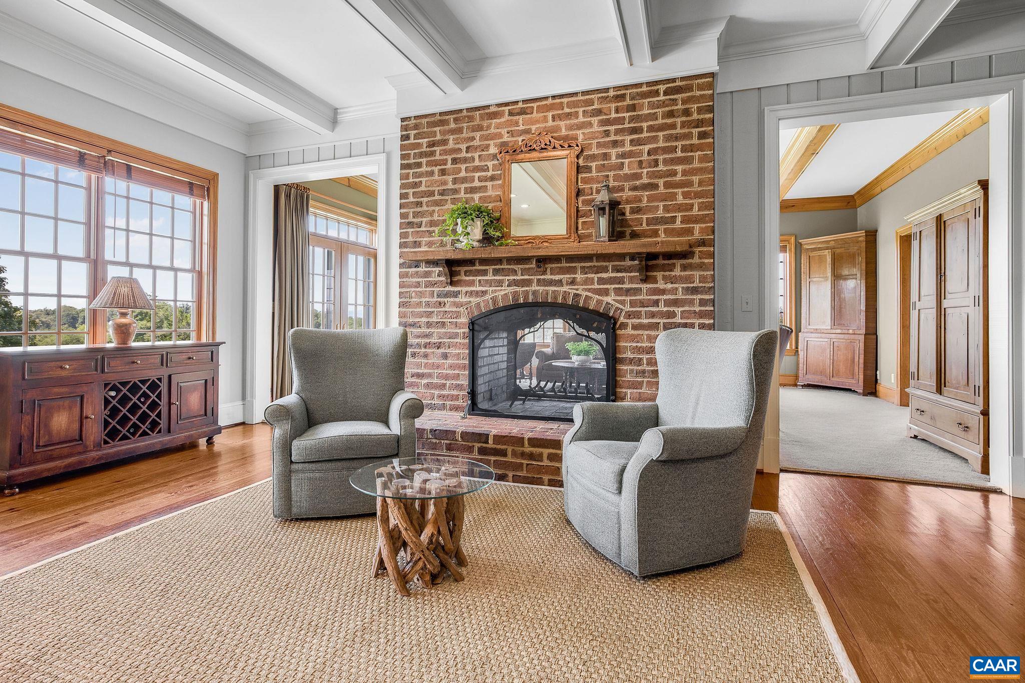 3365 Stony Point Road Charlottesville, VA 22911 - Photo 27 of 75 a living room with furniture and a fireplace