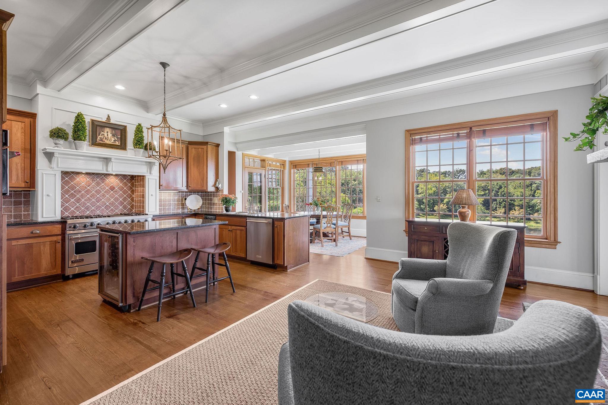 3365 Stony Point Road Charlottesville, VA 22911 - Photo 28 of 75 a living room with couches a coffee table and chairs