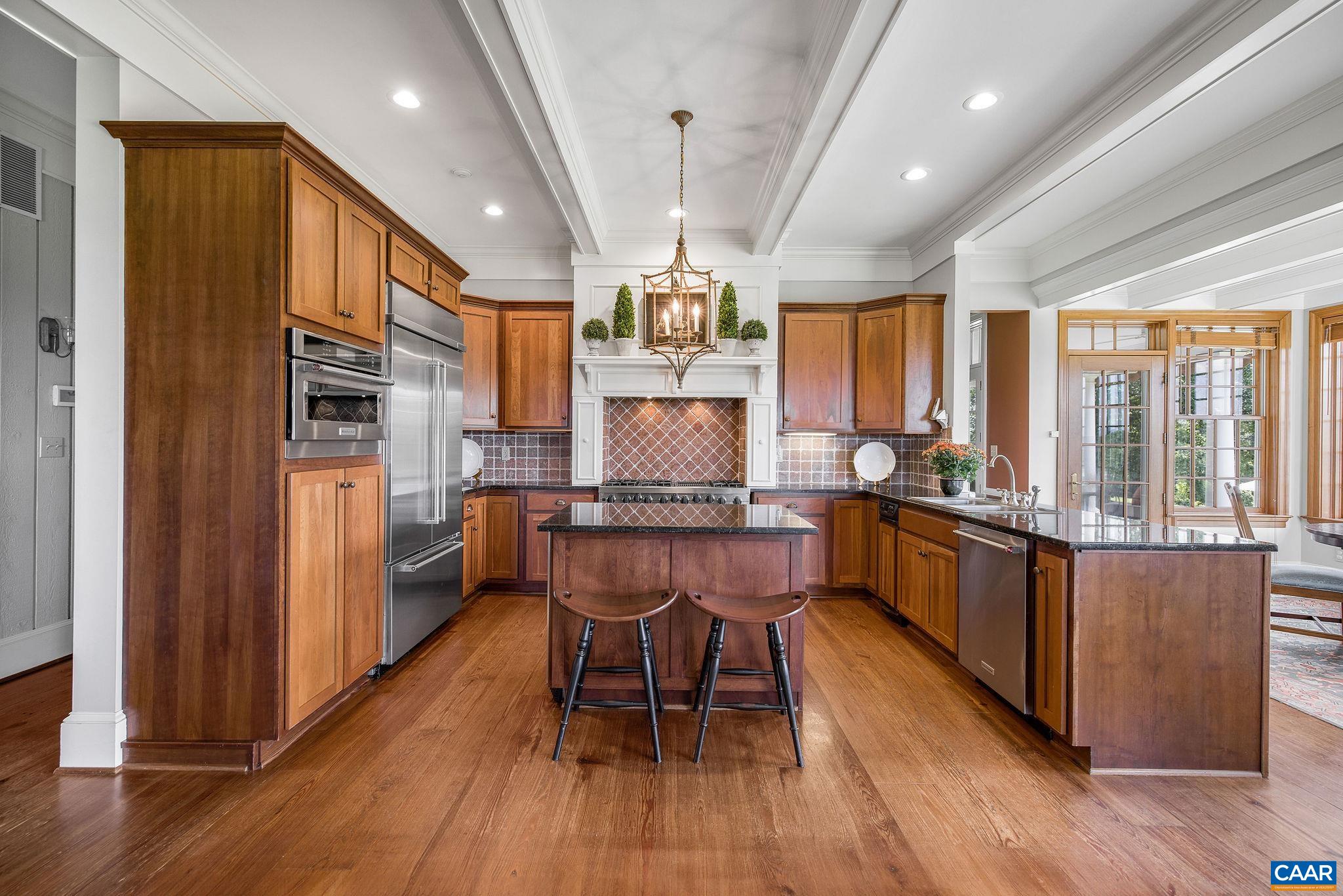 3365 Stony Point Road Charlottesville, VA 22911 - Photo 29 of 75 a large kitchen with a table and chairs