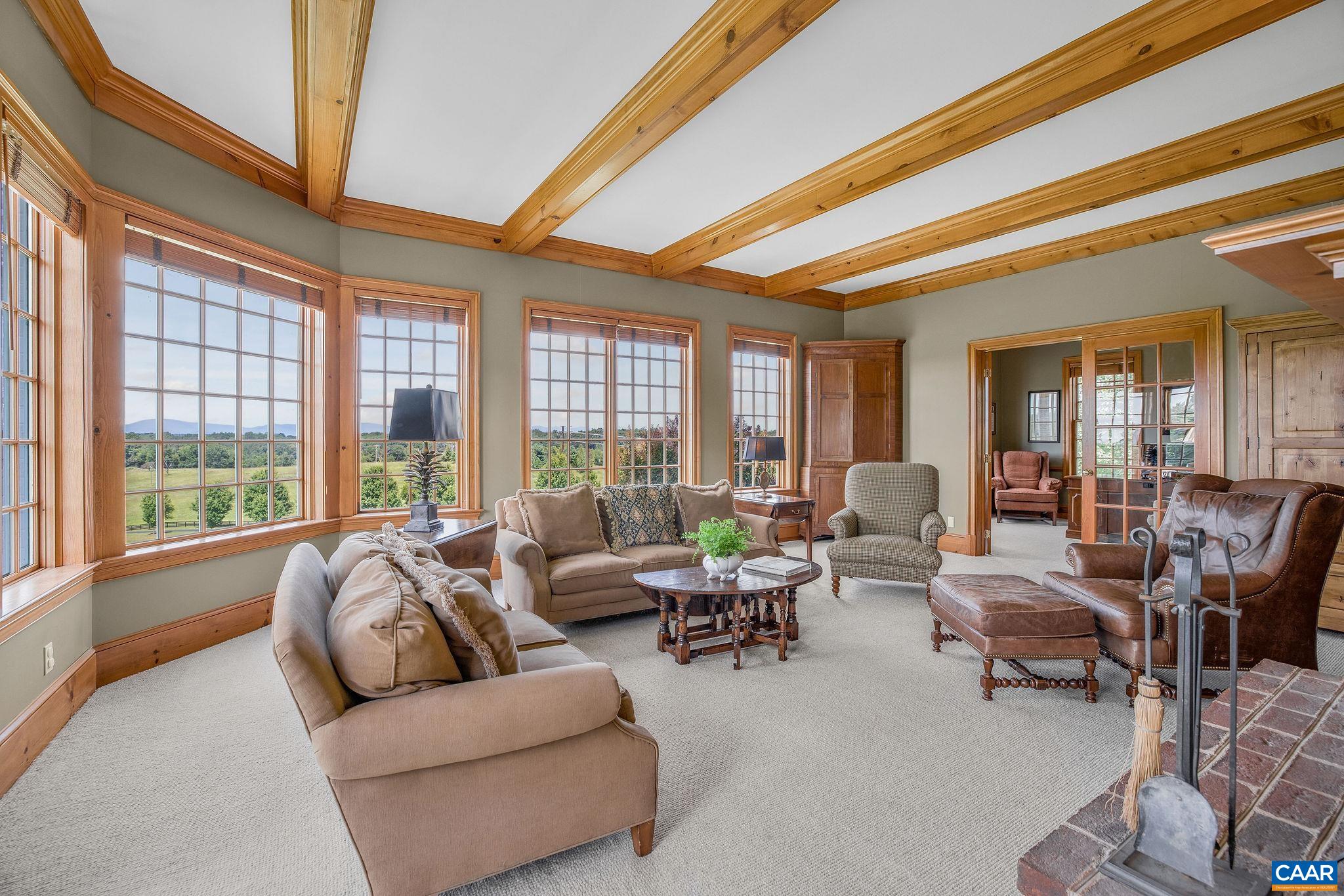 3365 Stony Point Road Charlottesville, VA 22911 - Photo 36 of 75 a living room with furniture and a large window