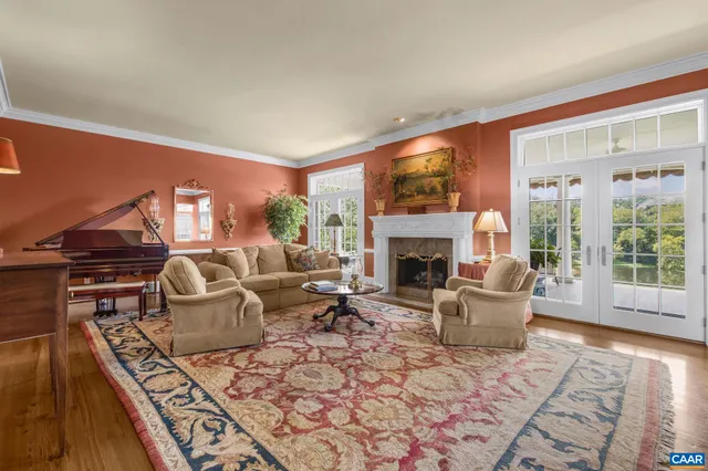 a spacious bathroom with a double vanity sink a mirror and a bathtub