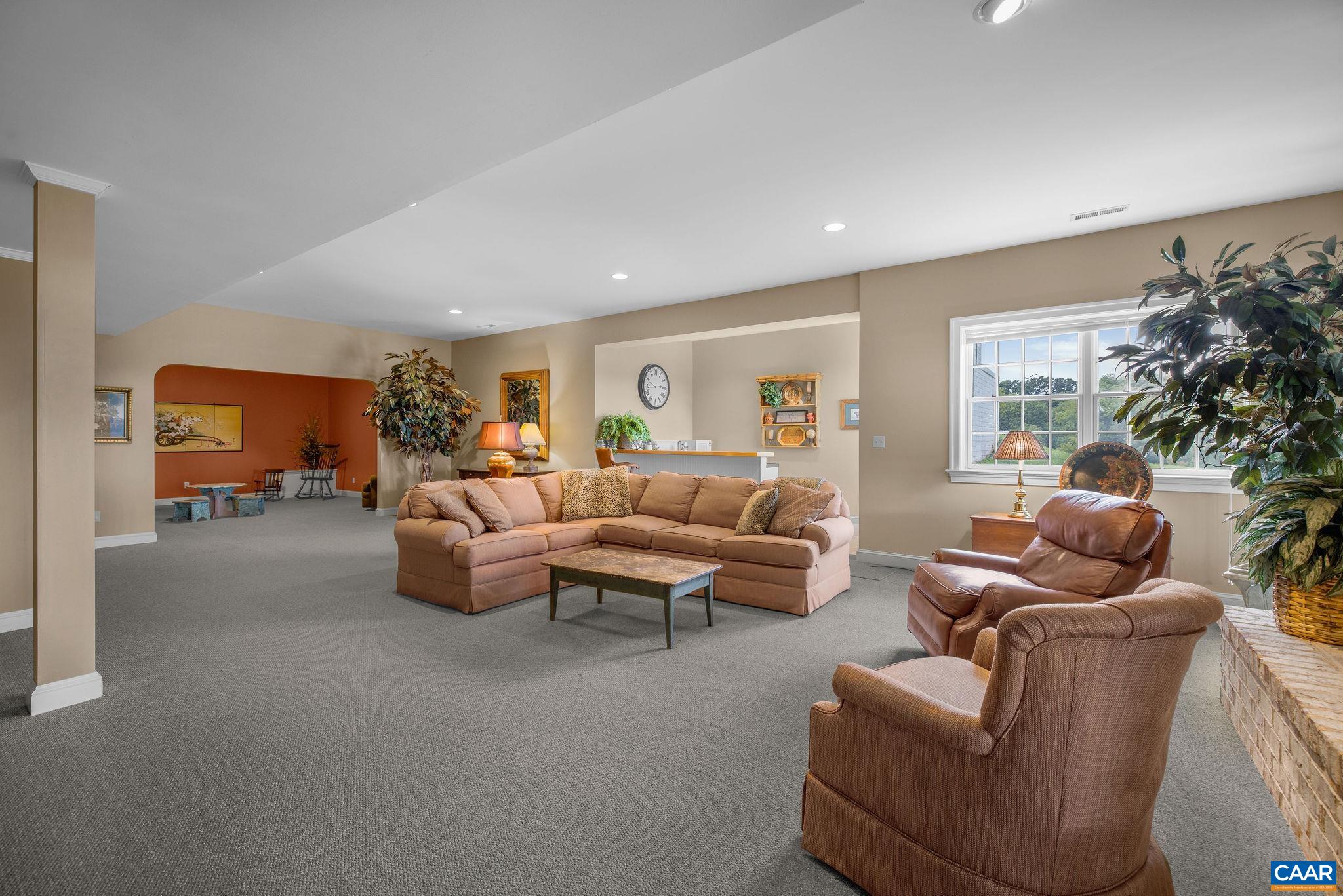 3365 Stony Point Road Charlottesville, VA 22911 - Photo 66 of 75 a living room with furniture and a large window