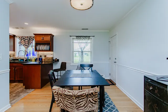 a view of a dining room with furniture