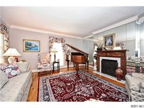 3013 Colony Road Charlotte, NC 28211 - Photo 3 of 16 a living room with furniture and a fireplace
