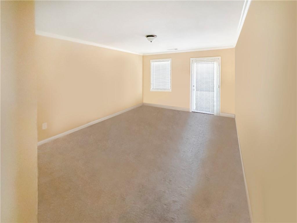 142 Liberty Trace Milner, GA 30257 - Photo 14 of 33 a view of an empty room with a window