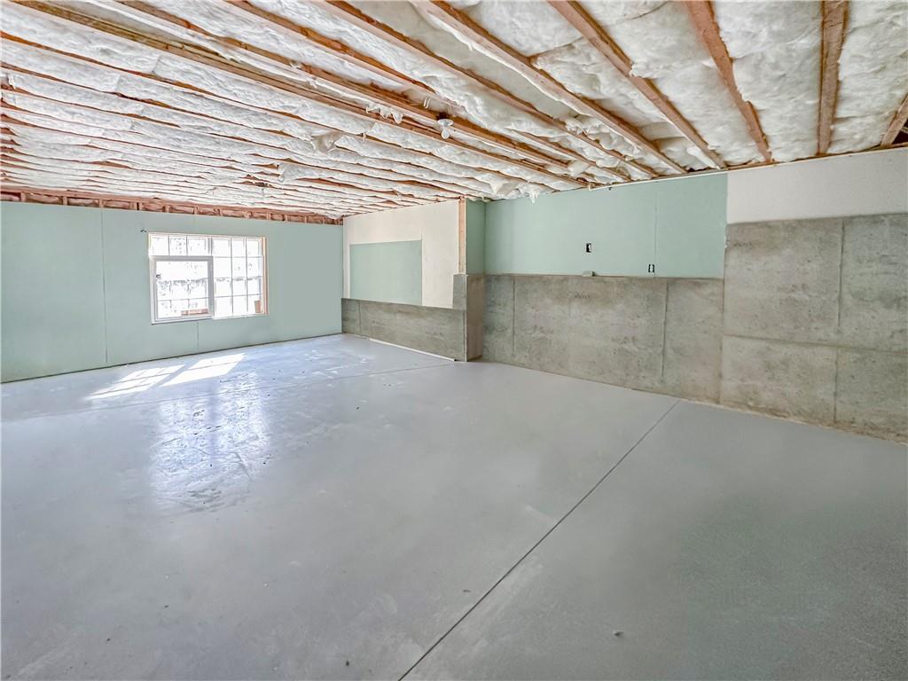 142 Liberty Trace Milner, GA 30257 - Photo 27 of 33 an empty room with windows