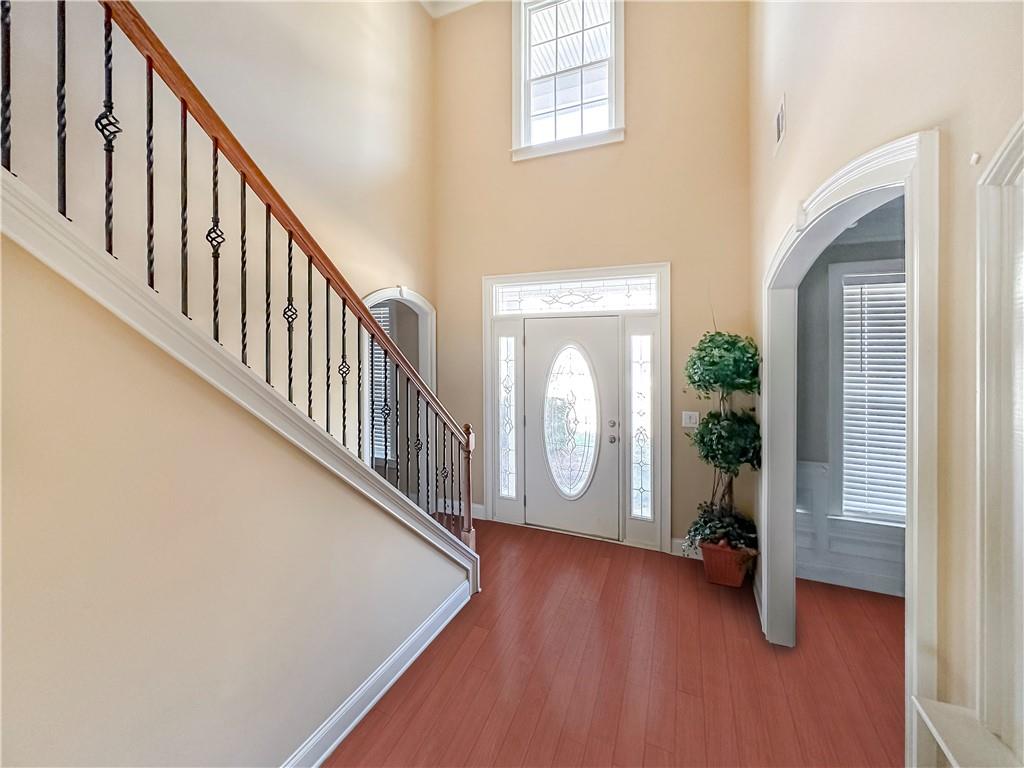 142 Liberty Trace Milner, GA 30257 - Photo 4 of 33 a view of an entryway with wooden floor