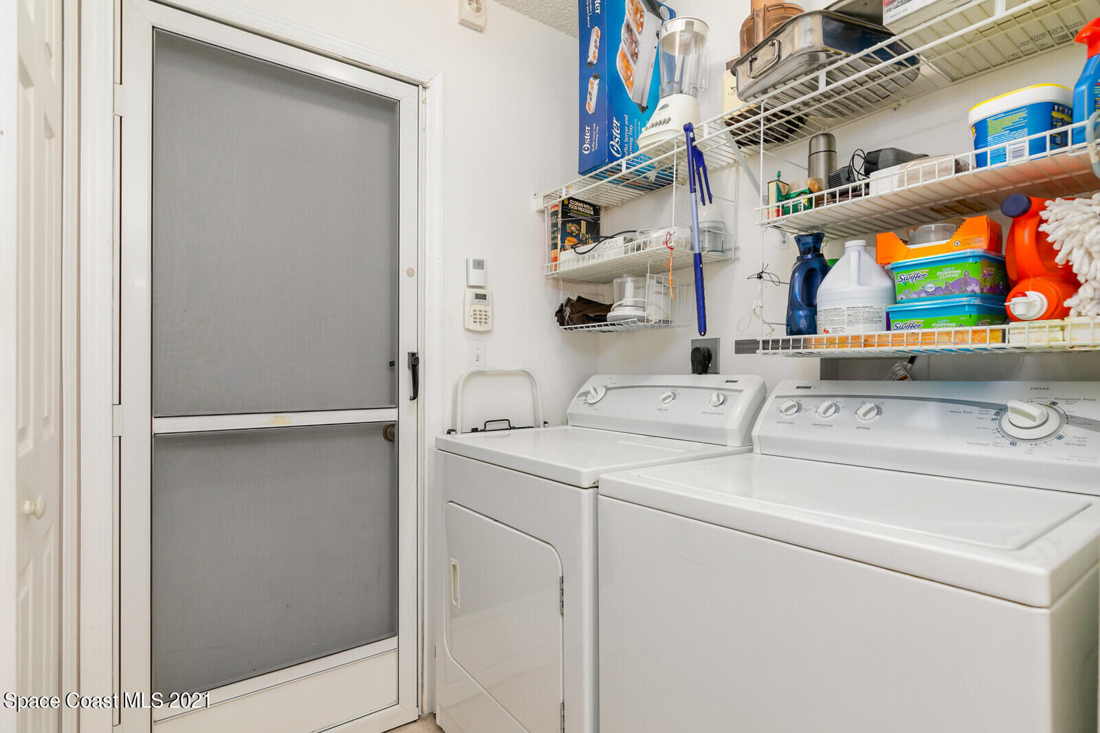 773 Furth Road Northwest Palm Bay, FL 32907 - Photo 13 of 29 a room with dryer and washer
