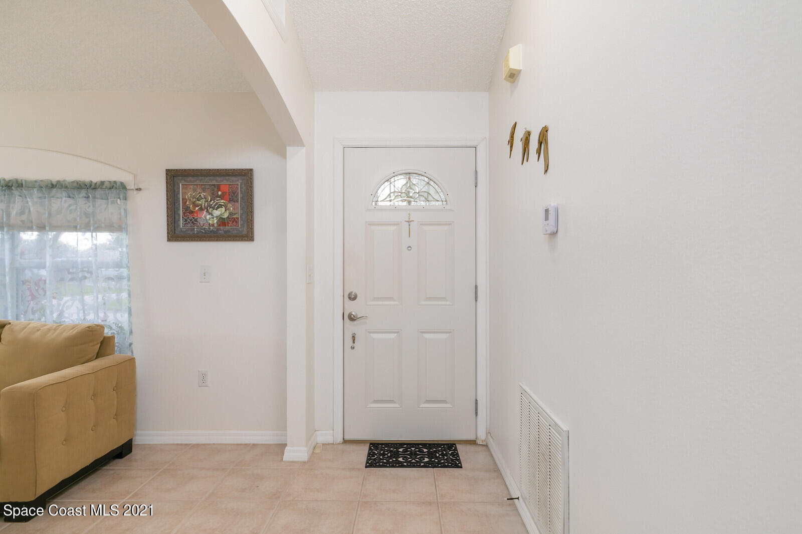 773 Furth Road Northwest Palm Bay, FL 32907 - Photo 14 of 29 a view of room with window and couch