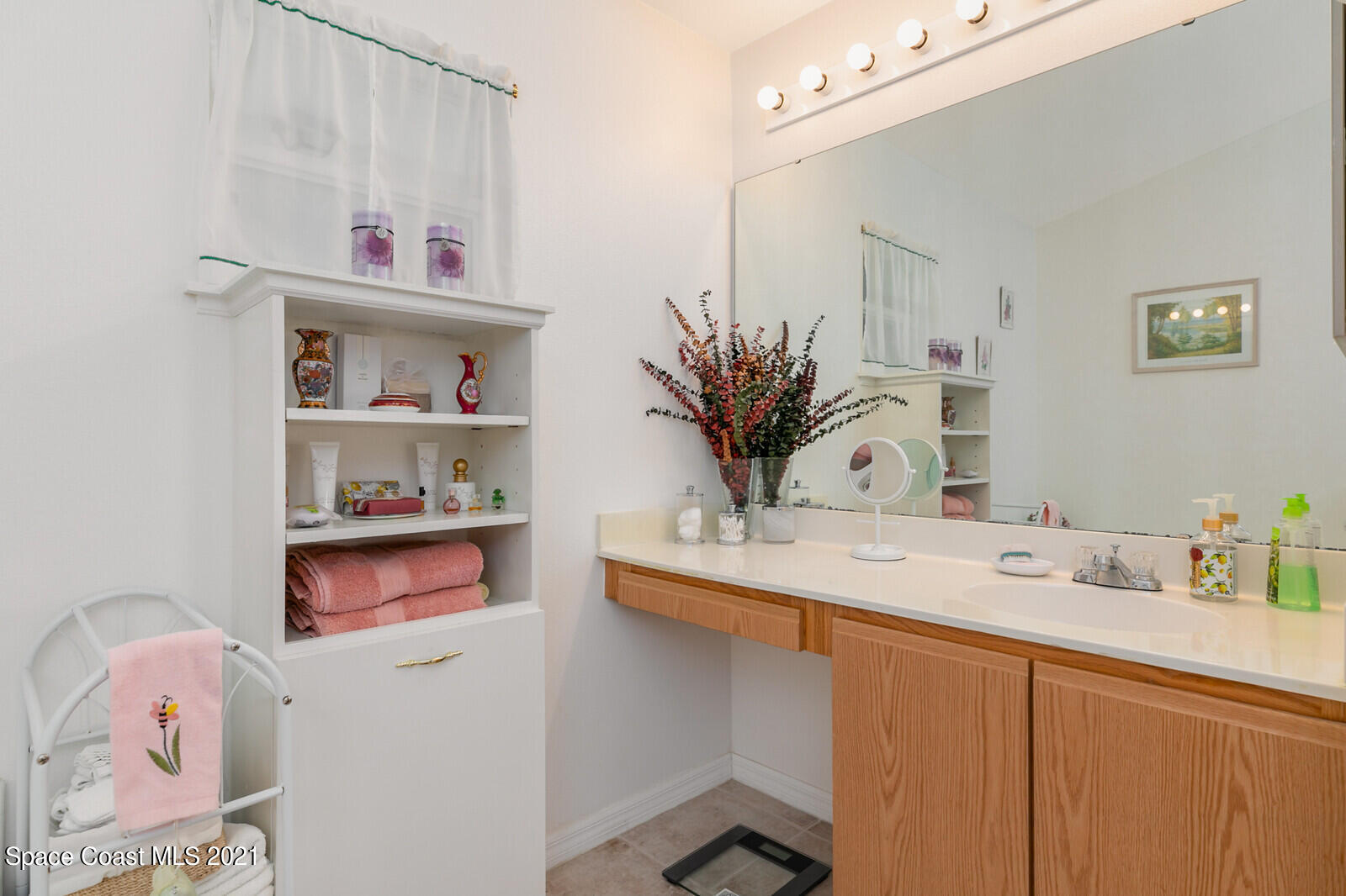 773 Furth Road Northwest Palm Bay, FL 32907 - Photo 19 of 29 a room with a wooden floor and cabinets