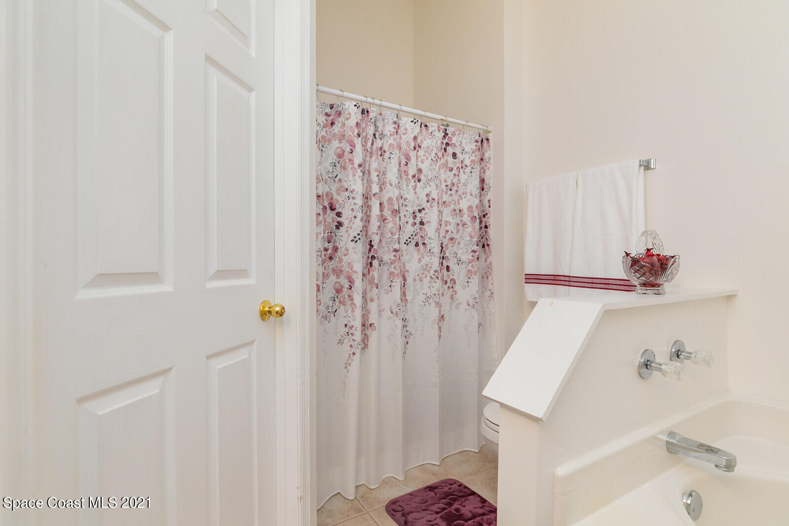 773 Furth Road Northwest Palm Bay, FL 32907 - Photo 21 of 29 a bathroom with a bathtub and shower