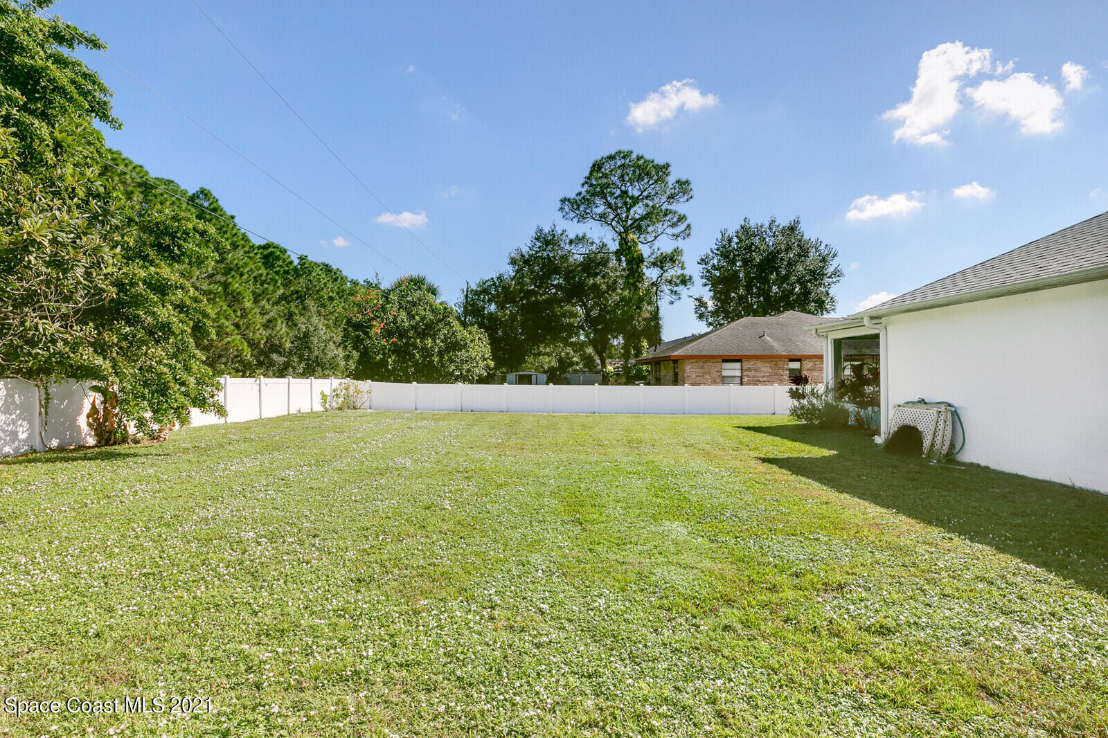 773 Furth Road Northwest Palm Bay, FL 32907 - Photo 27 of 29 a view of a backyard with a garden