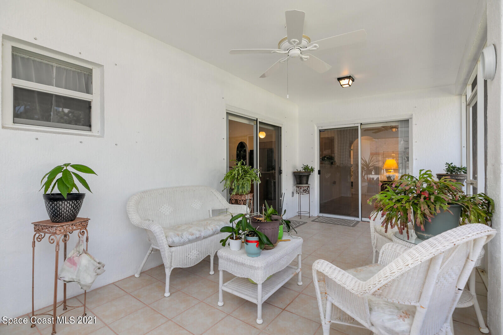 773 Furth Road Northwest Palm Bay, FL 32907 - Photo 29 of 29 a living room with furniture potted plant and kitchen view