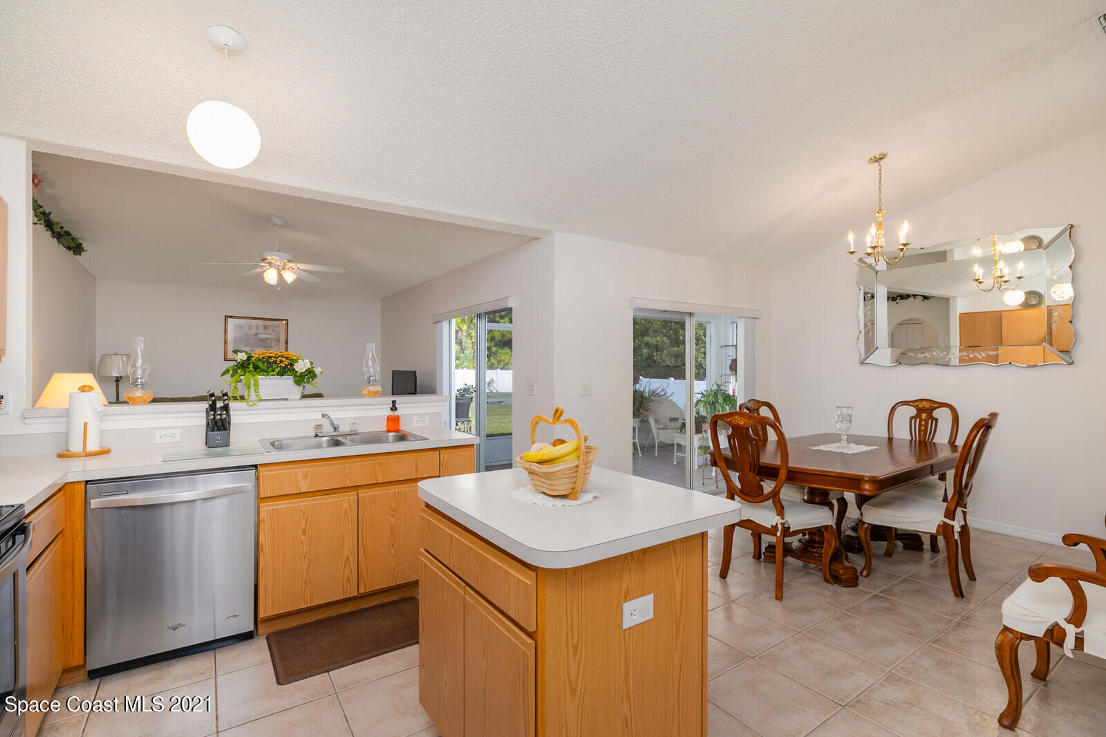 773 Furth Road Northwest Palm Bay, FL 32907 - Photo 10 of 29 a view of a kitchen area with appliances and dining table