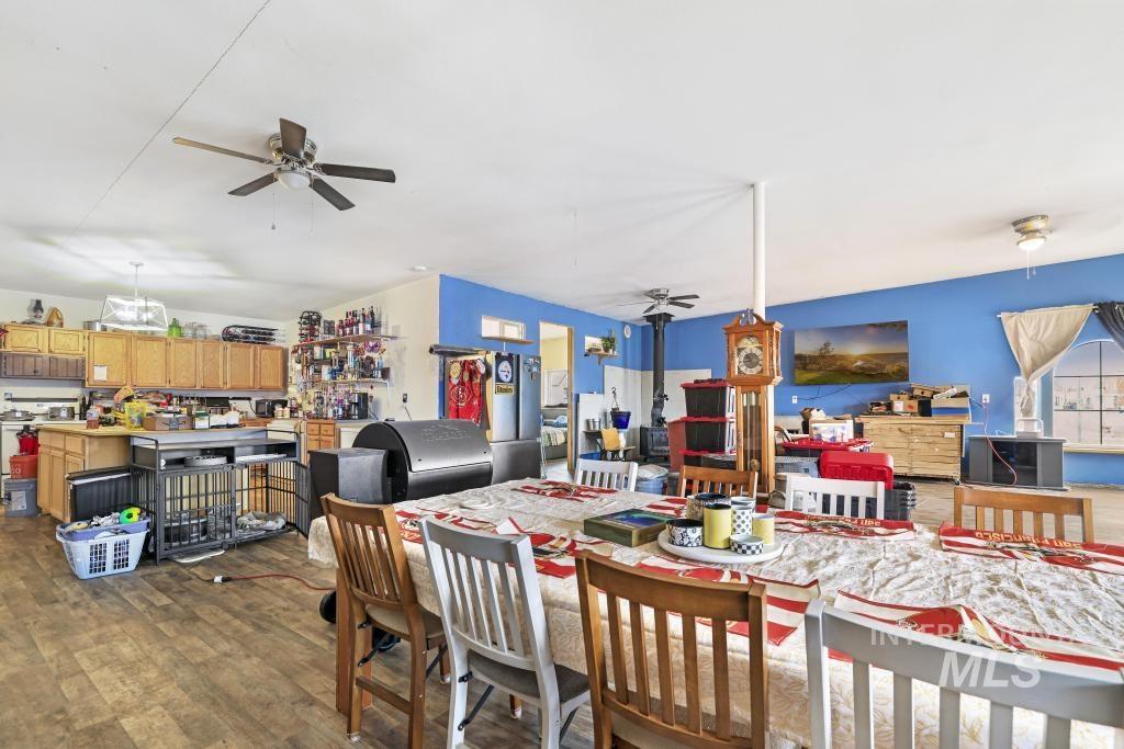 315 Wilson Street Eden, ID 83325 - Photo 12 of 30 Dining area featuring ceiling fan and dark wood finished floors